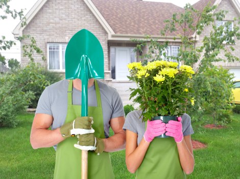 Professional lawn mower in action maintaining a green lawn
